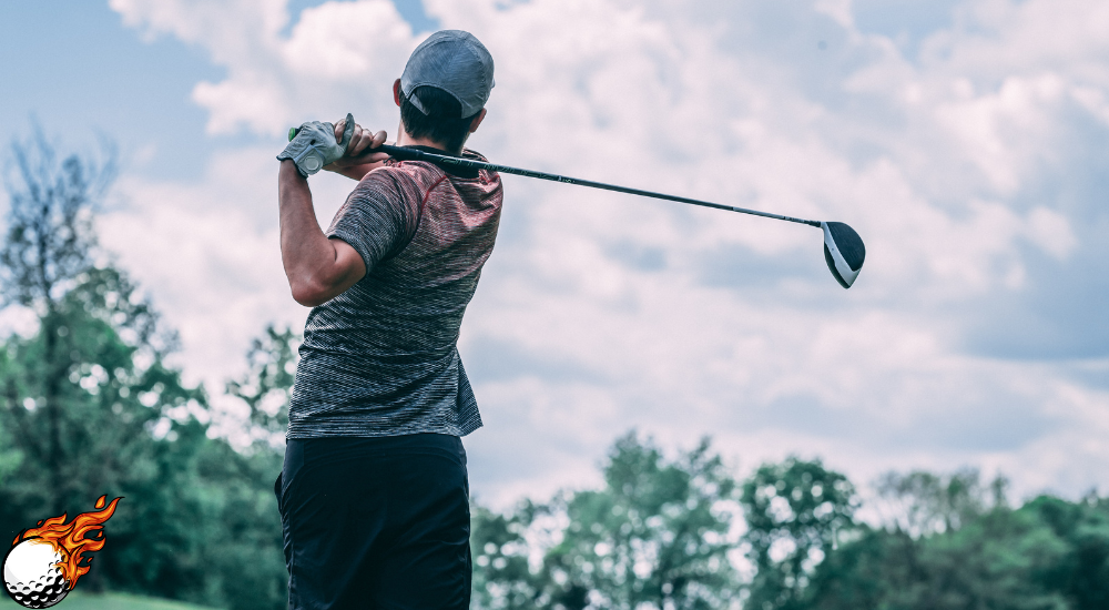 A man with a golf club
